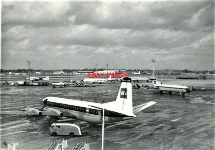 PHOTO AIRCRAFT AT HEATHROW AIRPORT WITH A VICKERS VANGUARD HAWKER